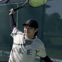 向上長コーチ